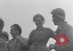 Image of Free French soldiers with civilians Normandy Foucarville France, 1944, second 54 stock footage video 65675079361