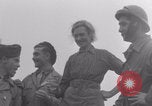 Image of Free French soldiers with civilians Normandy Foucarville France, 1944, second 56 stock footage video 65675079361
