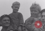 Image of Free French soldiers with Normandy children Foucarville France, 1944, second 15 stock footage video 65675079362