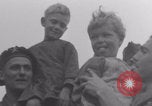 Image of Free French soldiers with Normandy children Foucarville France, 1944, second 16 stock footage video 65675079362