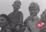 Image of Free French soldiers with Normandy children Foucarville France, 1944, second 17 stock footage video 65675079362