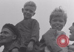 Image of Free French soldiers with Normandy children Foucarville France, 1944, second 19 stock footage video 65675079362