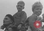 Image of Free French soldiers with Normandy children Foucarville France, 1944, second 20 stock footage video 65675079362