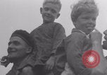 Image of Free French soldiers with Normandy children Foucarville France, 1944, second 21 stock footage video 65675079362