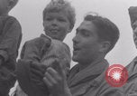 Image of Free French soldiers with Normandy children Foucarville France, 1944, second 26 stock footage video 65675079362
