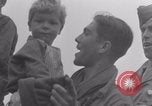 Image of Free French soldiers with Normandy children Foucarville France, 1944, second 28 stock footage video 65675079362