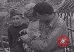 Image of Free French soldiers with Normandy children Foucarville France, 1944, second 52 stock footage video 65675079362