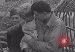 Image of Free French soldiers with Normandy children Foucarville France, 1944, second 55 stock footage video 65675079362
