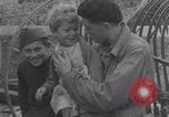 Image of Free French soldiers with Normandy children Foucarville France, 1944, second 59 stock footage video 65675079362