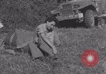 Image of French nurses prepare ambulance Lessay France, 1944, second 4 stock footage video 65675079369