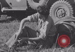 Image of French nurses prepare ambulance Lessay France, 1944, second 13 stock footage video 65675079369