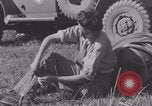 Image of French nurses prepare ambulance Lessay France, 1944, second 14 stock footage video 65675079369
