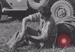Image of French nurses prepare ambulance Lessay France, 1944, second 15 stock footage video 65675079369