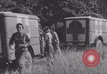 Image of French nurses prepare ambulance Lessay France, 1944, second 16 stock footage video 65675079369