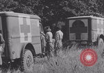 Image of French nurses prepare ambulance Lessay France, 1944, second 17 stock footage video 65675079369
