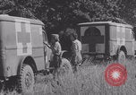 Image of French nurses prepare ambulance Lessay France, 1944, second 18 stock footage video 65675079369