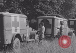 Image of French nurses prepare ambulance Lessay France, 1944, second 20 stock footage video 65675079369