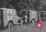 Image of French nurses prepare ambulance Lessay France, 1944, second 21 stock footage video 65675079369