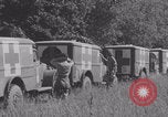 Image of French nurses prepare ambulance Lessay France, 1944, second 25 stock footage video 65675079369