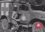 Image of French nurses prepare ambulance Lessay France, 1944, second 27 stock footage video 65675079369