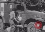 Image of French nurses prepare ambulance Lessay France, 1944, second 28 stock footage video 65675079369