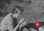 Image of French nurses prepare ambulance Lessay France, 1944, second 33 stock footage video 65675079369
