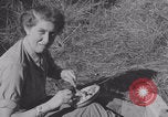 Image of French nurses prepare ambulance Lessay France, 1944, second 39 stock footage video 65675079369