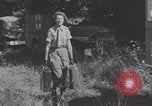Image of French nurses prepare ambulance Lessay France, 1944, second 46 stock footage video 65675079369