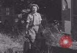 Image of French nurses prepare ambulance Lessay France, 1944, second 47 stock footage video 65675079369