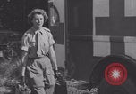 Image of French nurses prepare ambulance Lessay France, 1944, second 48 stock footage video 65675079369