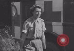 Image of French nurses prepare ambulance Lessay France, 1944, second 49 stock footage video 65675079369