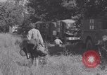Image of French nurses prepare ambulance Lessay France, 1944, second 52 stock footage video 65675079369