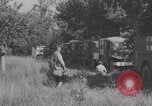Image of French nurses prepare ambulance Lessay France, 1944, second 55 stock footage video 65675079369