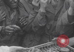 Image of Donut Dolly with Free French soldiers Southampton England, 1944, second 32 stock footage video 65675079386
