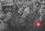 Image of Donut Dolly with Free French soldiers Southampton England, 1944, second 34 stock footage video 65675079386