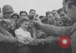 Image of Donut Dolly with Free French soldiers Southampton England, 1944, second 37 stock footage video 65675079386