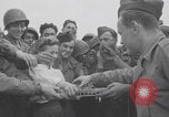 Image of Donut Dolly with Free French soldiers Southampton England, 1944, second 38 stock footage video 65675079386