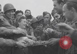 Image of Donut Dolly with Free French soldiers Southampton England, 1944, second 40 stock footage video 65675079386