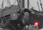 Image of M3 half-track hoisted to LST Southampton England, 1944, second 24 stock footage video 65675079387