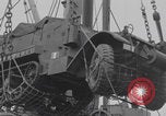 Image of M3 half-track hoisted to LST Southampton England, 1944, second 25 stock footage video 65675079387