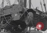 Image of M3 half-track hoisted to LST Southampton England, 1944, second 26 stock footage video 65675079387
