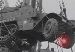 Image of M3 half-track hoisted to LST Southampton England, 1944, second 29 stock footage video 65675079387