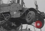 Image of M3 half-track hoisted to LST Southampton England, 1944, second 30 stock footage video 65675079387