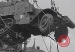 Image of M3 half-track hoisted to LST Southampton England, 1944, second 35 stock footage video 65675079387