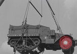 Image of M3 half-track hoisted to LST Southampton England, 1944, second 39 stock footage video 65675079387