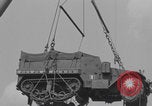 Image of M3 half-track hoisted to LST Southampton England, 1944, second 40 stock footage video 65675079387