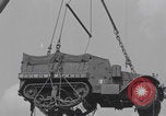 Image of M3 half-track hoisted to LST Southampton England, 1944, second 41 stock footage video 65675079387