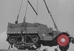 Image of M3 half-track hoisted to LST Southampton England, 1944, second 43 stock footage video 65675079387