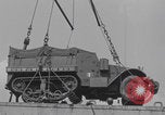 Image of M3 half-track hoisted to LST Southampton England, 1944, second 44 stock footage video 65675079387