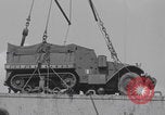 Image of M3 half-track hoisted to LST Southampton England, 1944, second 45 stock footage video 65675079387